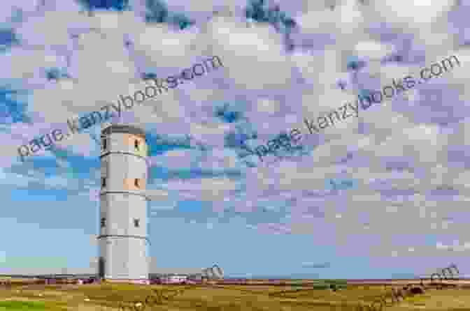 A Black And White Photo Of Harriet Searle Standing In Front Of The Flamborough Head Lighthouse. Sincerely Harriet Sarah Winifred Searle